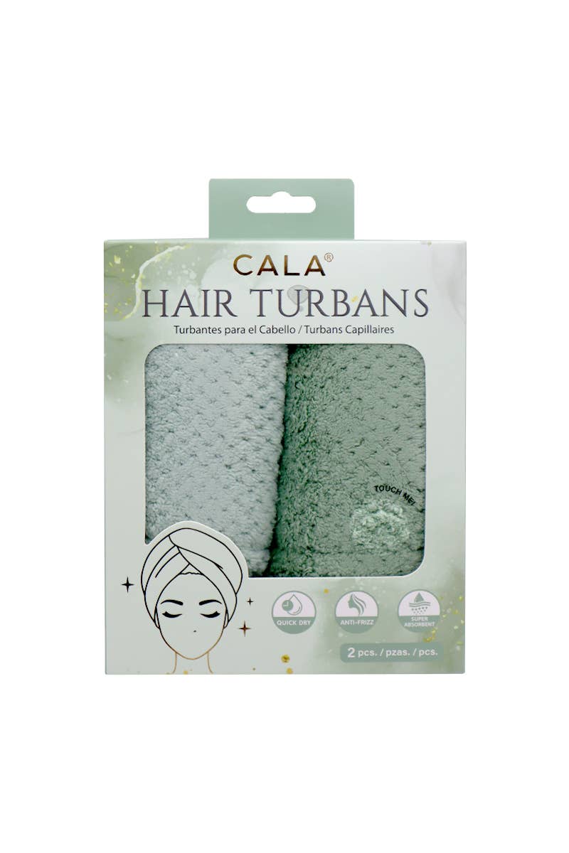 Packaging of Cala Hair Turbans with two green hair turbans inside on a white background.