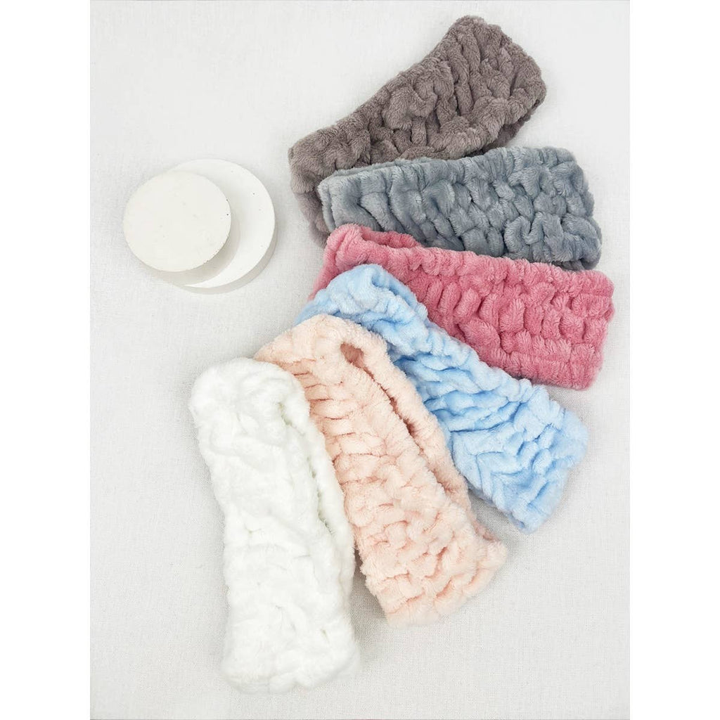 Set of colorful textured headbands on a white background