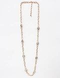 Gold chain necklace on a white background