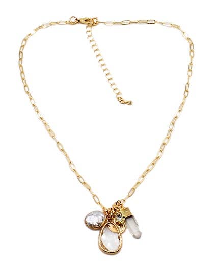 Gold necklace with pendant on a white background