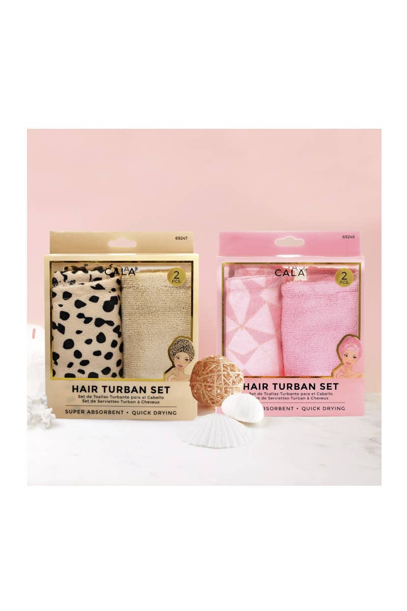 Two hair turban sets in packaging on a pink background